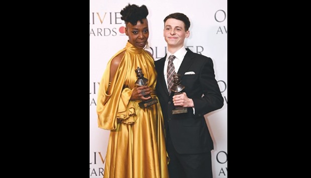 Noma Dumezweni, winner of Best Actress in Supporting Role for Harry Potter And The Cursed Child and Anthony Boyle, winner of the Best Actor in a Supporting Role award for Harry Potter And The Cursed Child pose with their awards during the 2017 Laurence Olivier Awards in London.