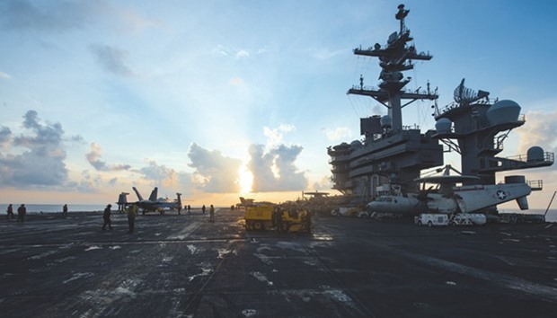 The aircraft carrier USS Carl Vinson transits the South China Sea on Saturday.