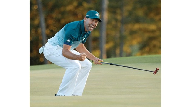 Sergio Garcia of Spain celebrates winning the Masters with a putt on the 18th green during a playoff against Justin Rose of England in the final round.