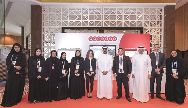 Ooredoo officials at the Arab Future Cities Summit.