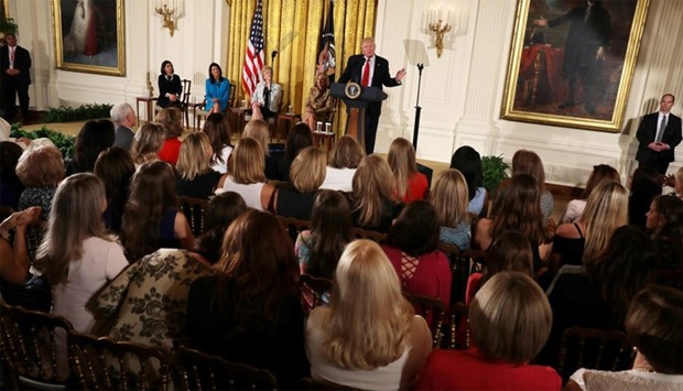 US President Donald Trump speaks at the East Room of the White House