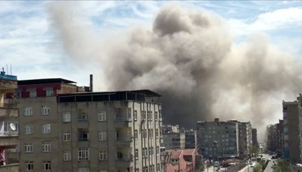 Smoke is seen coming out from a building after an explosion in Diyarbakir, Turkey in this still frame taken from video.