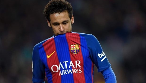 Barcelona's Brazilian forward Neymar biting on his jersey during a Spanish league match in Barcelona last month.