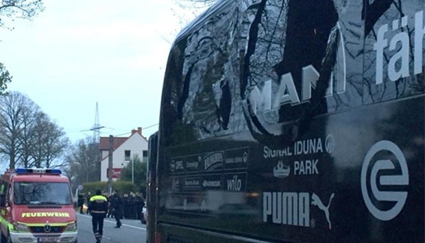 The damaged bus of Borussia Dortmund is pictured after an explosion on Tuesday. 