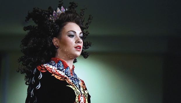 A dancer performs onstage during the World Irish Dancing Championships in Dublin, Ireland, yesterday.