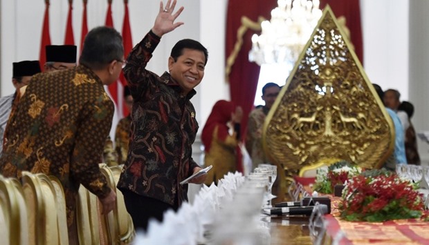 The speaker of Indonesia's parliament, Setya Novanto, waves before meeting with Indonesian President Joko Widodo at the Presidential Palace in Jakarta, Indonesia March 14, 2017