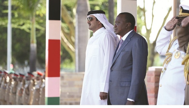 HH the Emir Sheikh Tamim bin Hamad al-Thani and Kenyan President Uhuru Kenyatta at the official reception ceremony hosted at the presidential Palace in Nairobi yesterday.