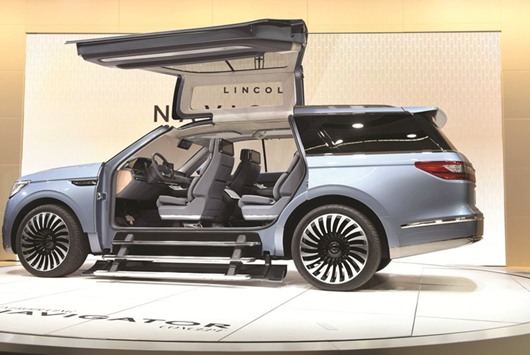 The Ford Motoru2019s Lincoln Navigator concept sports utility vehicle (SUV). Clad in aluminium body panels, the Navigator that made its debut yesterday at the New York International Auto Show weighs in 200 pounds lighter.