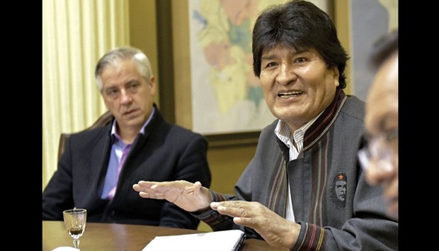 Bolivia President Evo Morales Ayma attends a ministerial cabinet meeting at the Quemado palace in La Paz yesterday. Morales had undergone throat surgery in Havana, Cuba, earlier this month.