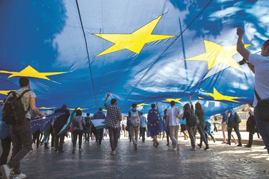 Thousands attend a rally to support the European Union on the occasion of the 60th anniversary of signing the Treaty of Rome at the Coliseum in Rome, Italy, on March 25.