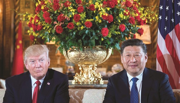 This file photo taken on April 6, 2017 shows US President Donald Trump with Chinese President Xi Jinping during a bilateral meeting at the Mar-a-Lago estate in West Palm Beach, Florida.