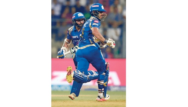 Mumbai Indians batsmen Parthiv Patel (left) and Nitish Rana run between the wickets during the match against Sunrisers Hyderabad in Mumbai yesterday. (AFP)