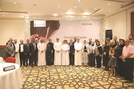 Qatar Red Crescent (QRCS) and AbbVie Biopharmaceuticals GmbH officials after signing a memorandum of understanding (MoU) to inaugurate a public hepatitis C awareness programme in Qatar. QRCS, AbbVie join hands to fight hepatitis C in Qatar