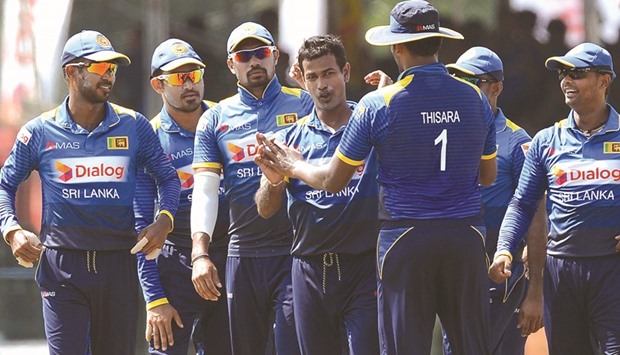 Sri Lankau2019s Nuwan Kulasekara celebrates after he dismissed Bangladesh batsman Sabbir Rahman during the third and final ODI at The Sinhalese Sports Club (SSC) Ground in Colombo yesterday. (AFP)
