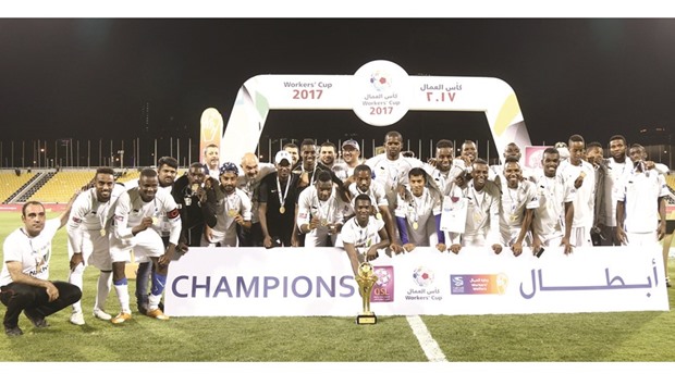 Nakheel Landscapes players celebrate their win in the Workersu2019 Cup final against Al Asmakh Facilities Management in Doha on Friday. PICTURES: Othman Iraqi
