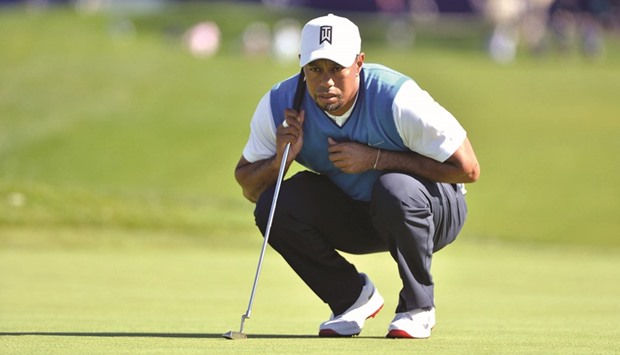 Tiger Woods lines up a putt on the 1st green during the first round of the Farmers Insurance Open golf tournament at Torrey Pines Municipal Golf Course on January 26, 2017. PICTURE: USA TODAY Sports