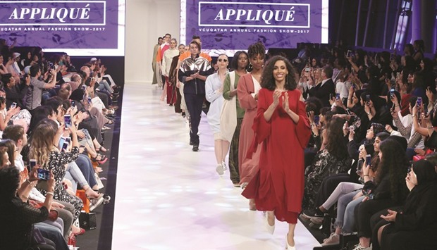 Models on the ramp towards the end of the fashion show yesterday. PICTURE: Jayan Orma
