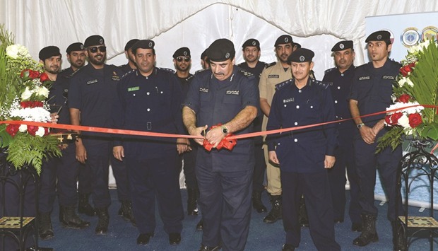 Staff Brigadier Ali Ahmed al-Budaid cutting a ribbon to open GCC Coast Guard Week. PICTURE: Noushad Thekkayil