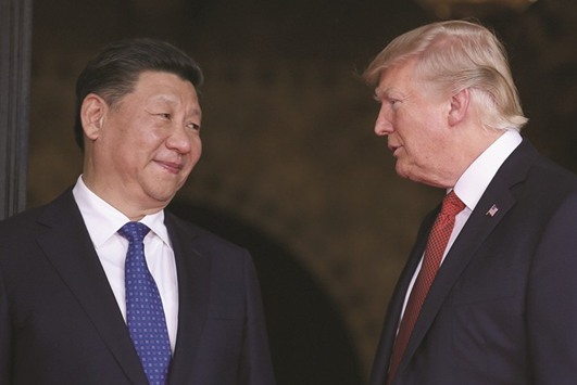 US President Donald Trump welcomes Chinese President Xi Jinping at Mar-a-Lago state in Palm Beach, Florida.