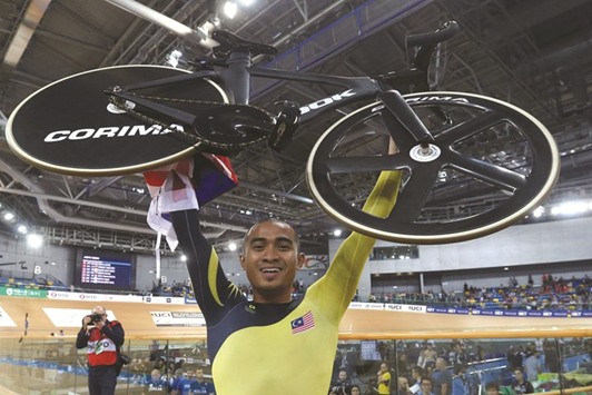 Malaysiau2019s Mohd Azizulhasni Awang celebrates after winning keirin gold yesterday. (Reuters)