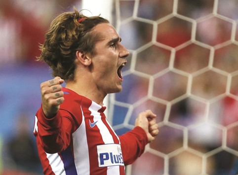 Atletico Madridu2019s Antoine Griezmann celebrates scoring a goal against Leicester City the first leg of their Champions League quarter-final in Madrid. (Reuters)