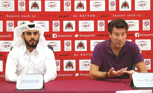 Al Rayyan coach Michael Laudrup (R) addresses media yesterday.