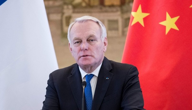 France's Foreign Minister Jean-Marc Ayrault speaks to journalists during a press conference with his Chinese counterpart Wang Yi (not pictured) after their meeting in Beijing on April 14, 2017.