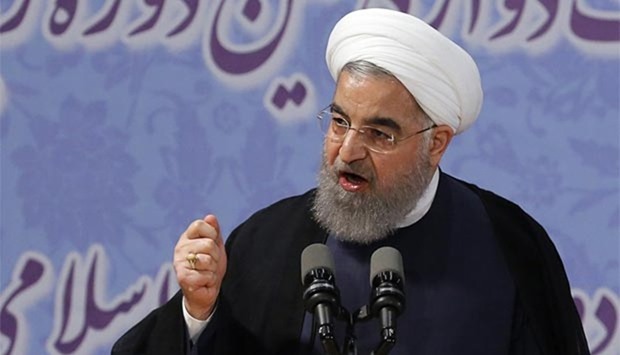 Iranian President Hassan Rouhani delivers a speech after registering to run for re-election, in Tehran on Friday.