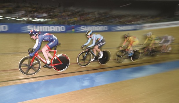 Britainu2019s Katie Archibald (left) competes in the womenu2019s omnium points race 4/4 at the Hong Kong Velodrome during the Track Cycling World Championships in Hong Kong, yesterday. (AFP)
