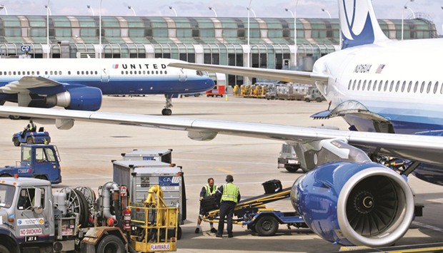 Workers load bags onto a United Airlines Airbus A319 jet at Ou2019Hare International Airport in Chicago. The prospect of Delta postponing or cancelling the wide-body order adds to uncertainty over Airbusu2019s efforts to make inroads in the US with its next-generation models.