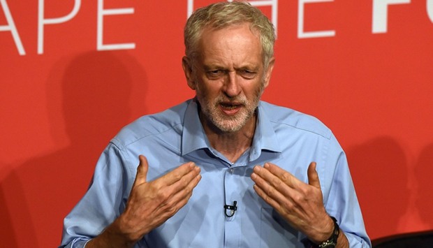 Jeremy Corbyn takes part in a Labour Party leadership hustings event in Warrington, north west England on July 25, 2015, hosted by journalist Paul Waugh. With Britainu2019s political class starting its summer recess this week, commentators say Labour must consider whether it wants to be simply a principled opposition or a party with a real shot at power at the next general election in 2020.
