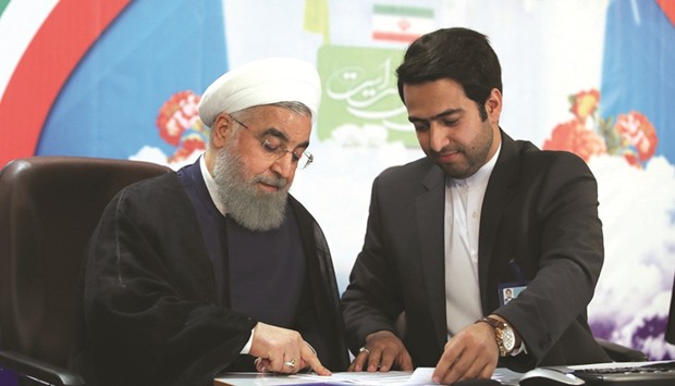 Iranu2019s President Hassan Rouhani registers to run for a second four-year term in the May election, in Tehran, yesterday.