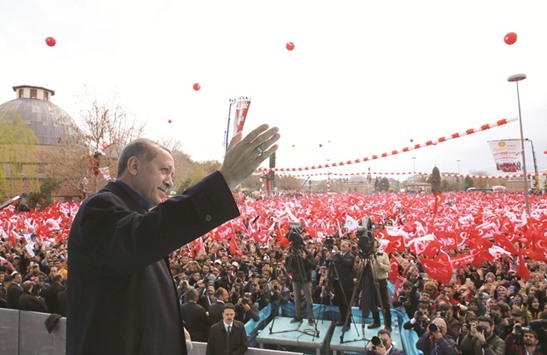 Erdogan delivering a speech to a rally of supporters in Konya yesterday.
