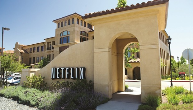 Netflix sign is seen at the entrance to the companyu2019s headquarters in Los Gatos, California. The longevity of the technology stocks rally is on the line this week as Netflix kicks off the earnings season for a sector that has mushroomed to account for more than a fifth of the US stock marketu2019s value.