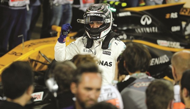 Mercedes Formula One driver Valtteri Bottas of Finland celebrates pole position after the qualifying session yesterday at the Bahrain Grand Prix.