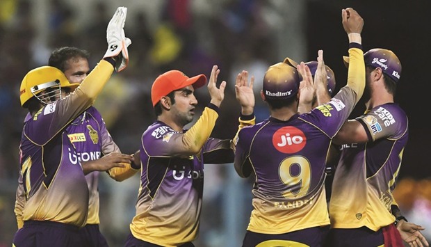 Kolkata Knight Riders captain Gautam Gambhir (C) celebrates with teammates after the dismissal of Sunrisers Hyderabad batsman Shikhar Dhawan during the 2017 Indian Premier League (IPL) match at the Eden Gardens in Kolkata yesterday. (AFP)