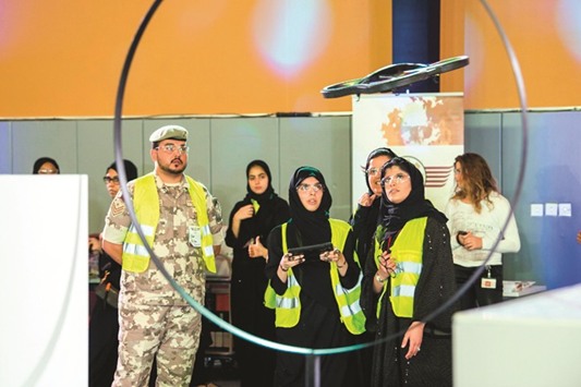 A group of girl students get trained at the Engineering Heroes camp.