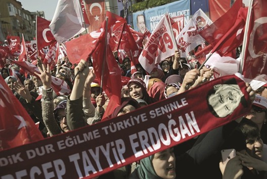 Supporters of the u2018yesu2019 campaign wave flags during a rally in Istanbul yesterday.