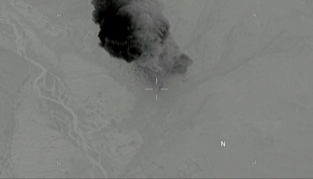 Still image taken from a video released by the US Department of Defense on April 14, 2017 shows the moment after a MOAB, or ,mother of all bombs,, struck the Achin district of the eastern province of Nangarhar, Afghanistan, bordering Pakistan where US officials said a network of tunnels and caves was being used by militants linked to Islamic State.