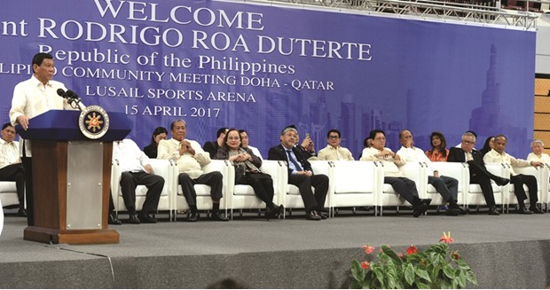 Philippine President Rodrigo Duterte on stage with a host of other dignitaries and officials. PICTURES: Thajudheen