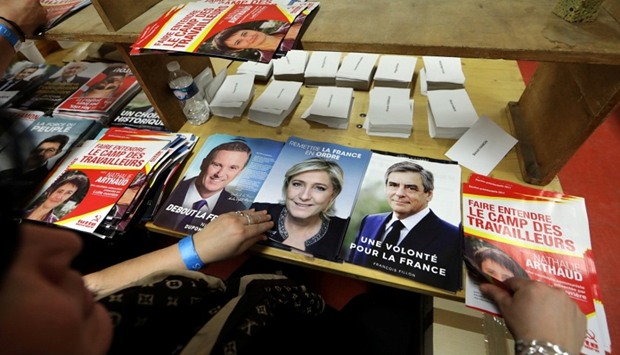 Civil servants prepare electoral documents for the upcoming French presidential election in Nice