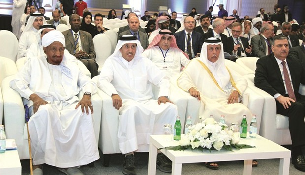 HE Ahmed bin Abdullah bin Zaid al-Mahmoud and HE Sheikh Hamad bin Thamer al-Thani with other guests at the opening of the 11th Al Jazeera Forum yesterday.