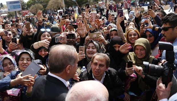 Turkish President Erdogan greets supporters