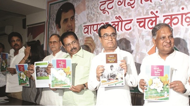 Delhi Congress chief Ajay Maken releases manifesto for the Delhi municipal polls in New Delhi yesterday.
