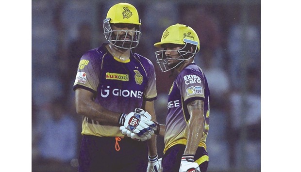 KKRu2019s Yusuf Pathan (L) is congratulated by teammate Manish Pandey as he celebrates his half-century against Delhi Daredevils yesterday. (AFP)