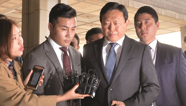 Lotte Group chairman Shin Dong-bin arrives at a prosecutoru2019s office in Seoul. Shin was charged with giving 7bn won ($6.2mn) to a sports foundation controlled by a confidante of Park, seeking support for regaining a duty-free operating licence at Lotte World Tower, according to a statement by prosecutors.