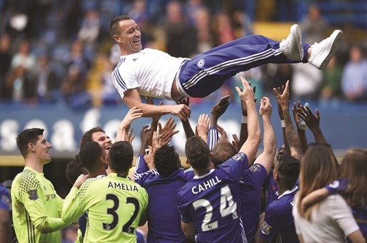 File photo of Chelseau2019s John Terry being thrown in the air by teammates.