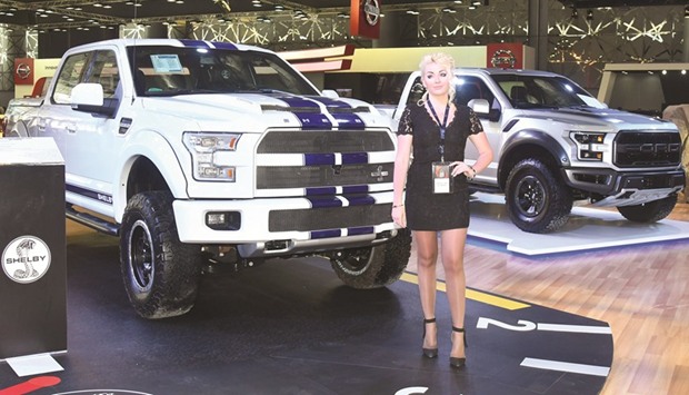 Shelby F-150 pick-up and the all-new F-150 Raptor on display.