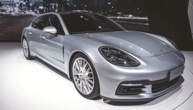 The new Porsche Panamera Executive is displayed during the media day of the 17th Shanghai International Automobile Industry Exhibition in Shanghai yesterday. Additional battery-powered models could flank a new sports car based on Porscheu2019s Mission E concept, which is due in 2019, division chief Oliver Blume said yesterday