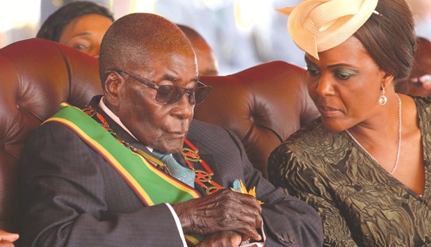 Zimbabwean President Robert Mugabe and his wife Grace attend a rally on Tuesday to mark the countryu2019s 37th independence anniversary in Harare.